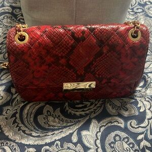 Michael Kors red and black sneak print sloan bag
